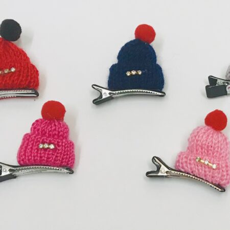 Spange auf Klip Pudelmütze